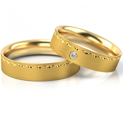 Obrączki ślubne złote satynowane z kamieniem próby 585