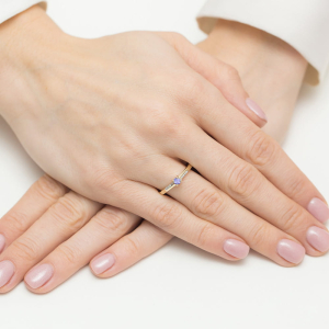 Pierścionek z Tanzanitem 0,15ct i Diamentami ze złota próby 585. W-0258TA