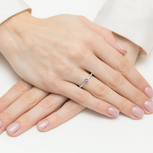 Pierścionek z Tanzanitem 0,15ct i Diamentami 0,07ct ze złota próby 585. W-0459TA