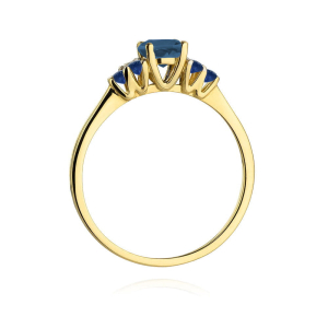 Pierścionek z Topazem London Blue 0,50 ct i Szafirami 0,30ct ze złota próby 585. W-451TLBSZ