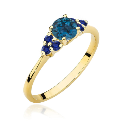 Pierścionek z Topazem London Blue 0,50 ct i Szafirami 0,30ct ze złota próby 585. W-451TLBSZ