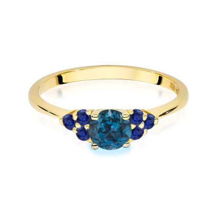 Pierścionek z Topazem London Blue 0,50 ct i Szafirami 0,30ct ze złota próby 585. W-451TLBSZ